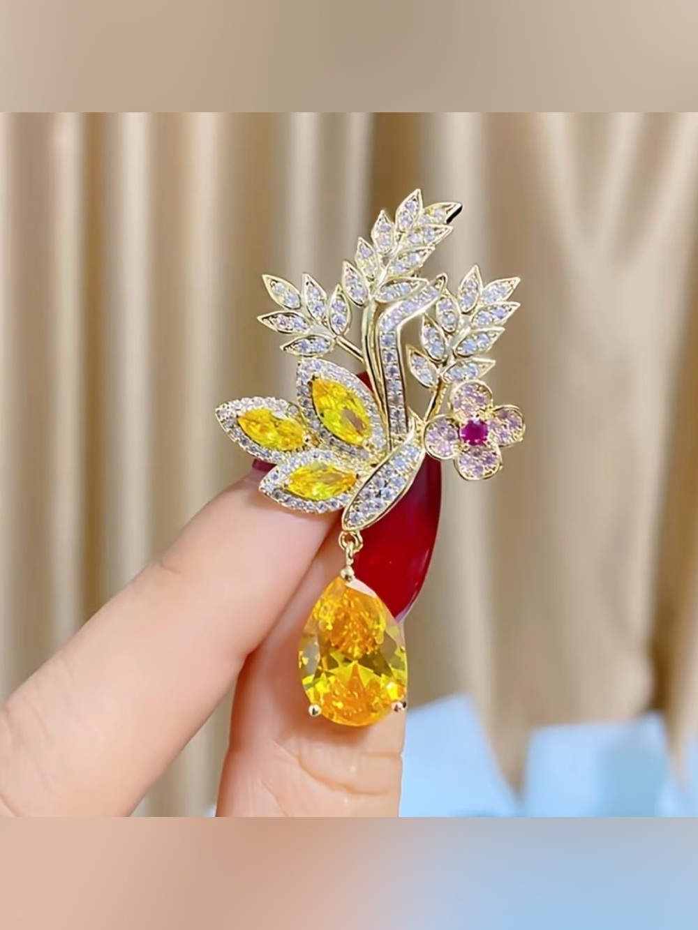 New gold-toned alloy wheat leaf brooch  a pear-cut yellow rhinestone drop